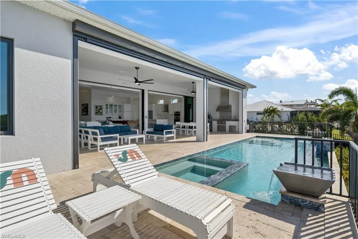 No better place to catch some sun and enjoy the outdoors!  This home is within walking distance to multiple parks and walking trails - Tropicana Park just started construction and will feature a boat launch, ramadas, common areas and so much more! Joe Stonis Park is right around the corner if you enjoy pickleball and tennis and includes walking paths and playgrounds.  Then there is Sirina Vista Park, an 8 acre environmenta park with a kayak launch to the Great Calusa Blueway.