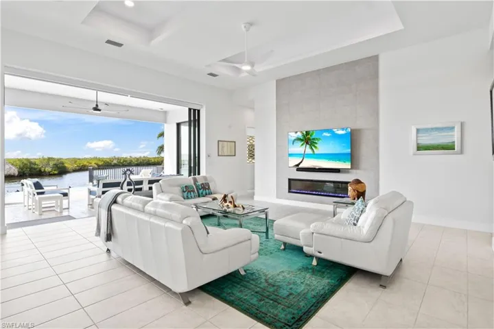 A serene and warm color palette throughout - luxurious and neutral with details such as a fireplace and accent wall add to the ambience of htis beautiful home!