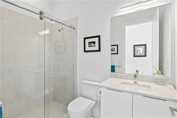 Hallway bath - one of three full bathrooms and there is also an additional half bath in the pool area!