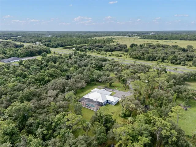 View of property location with a forest
