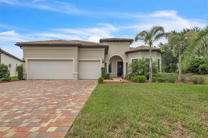 Front of the home with large driveway