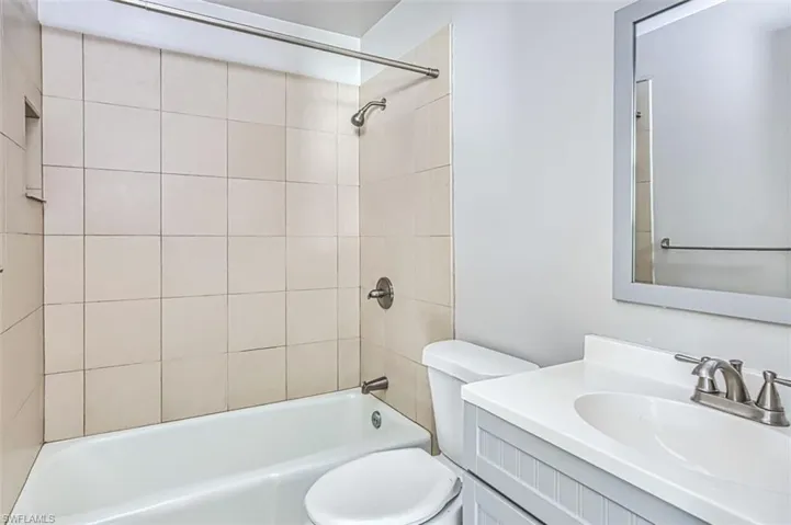 Full bathroom featuring vanity and tub / shower combination