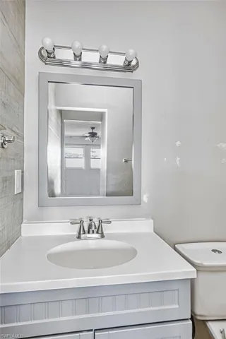 Bathroom with vanity and toilet