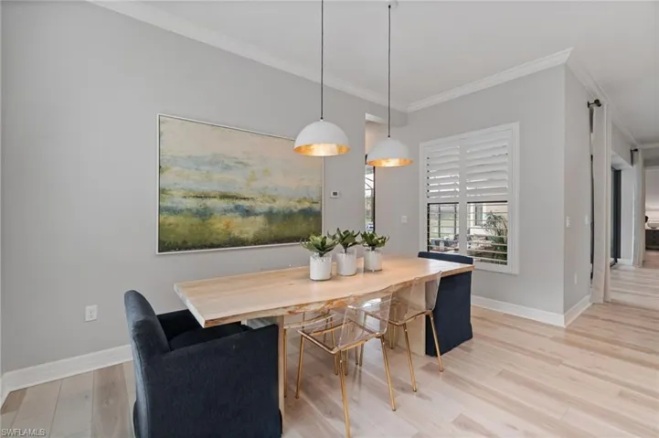 Beautiful Coastal modern design continues in the ear in Dining area with spacious room for 6-8 and statement pendant lighting.