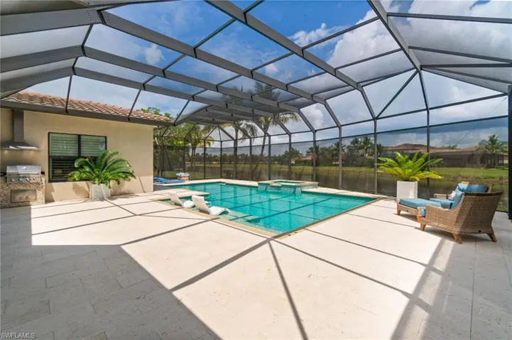Rare and Expansive pool and deck area with room for multiple outdoor seating areas.