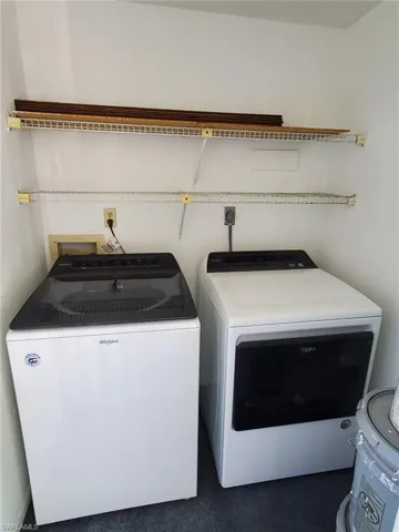 Laundry area featuring independent washer and dryer
