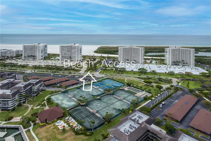 Aerial view with a city view and a water view