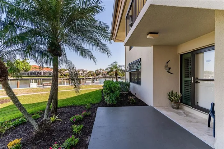View of patio / terrace featuring a water view