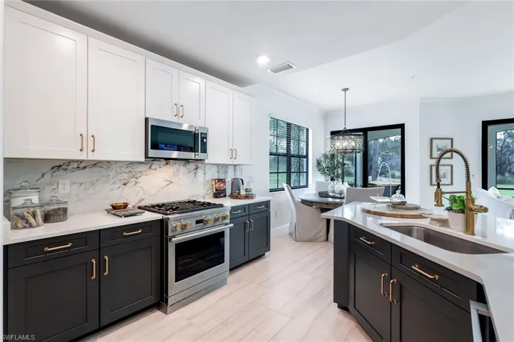 Gas range with brass knobs and hardware