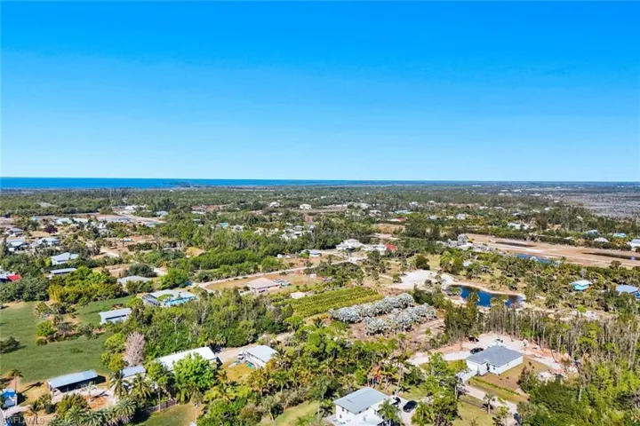 Aerial view of residential area with a nearby body of water