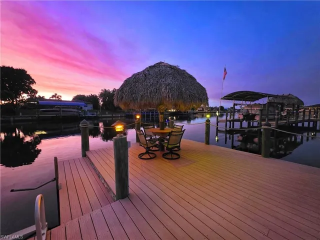 Dock with a water view and boat lift