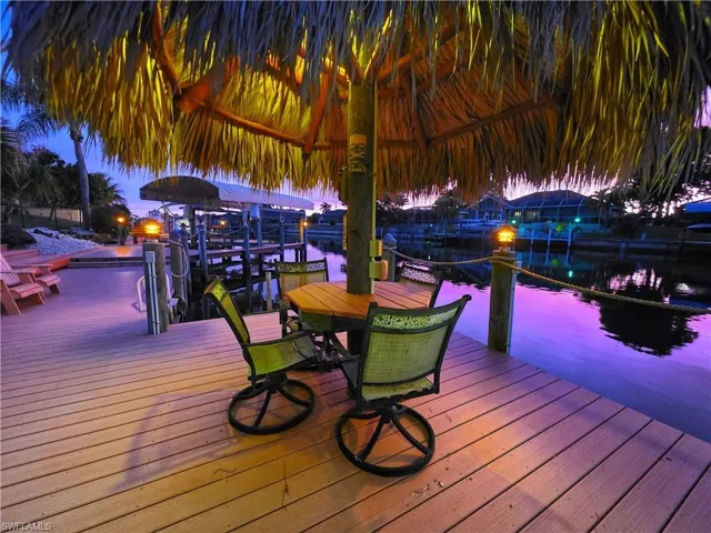 Dock with a water view and boat lift