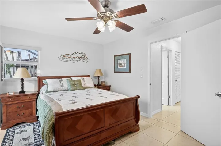 Bedroom featuring ceiling fan and light tile patterned floors