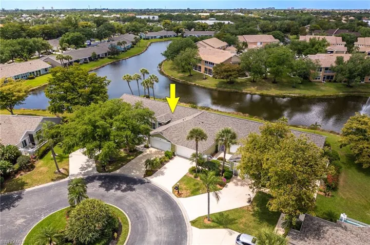 Aerial view with a residential view and a water view
