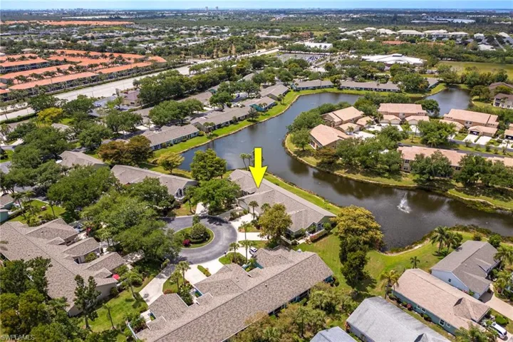 Aerial view featuring a residential view and a water view
