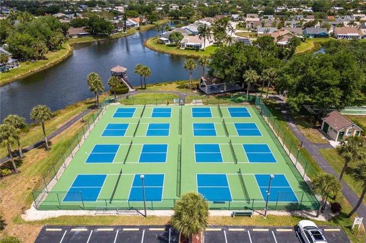 Aerial view with a water view and a residential view