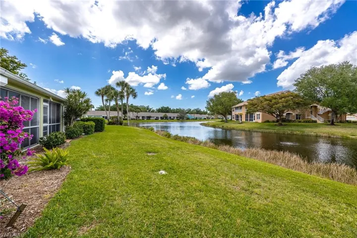 Property view of water with a residential view