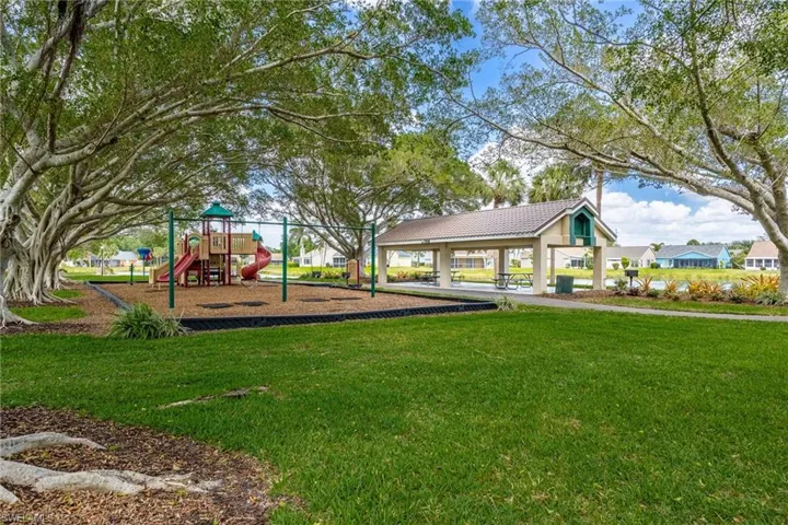 Community play area with a lawn