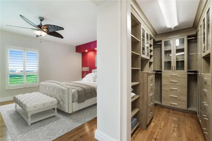 Custom his and her closets.
