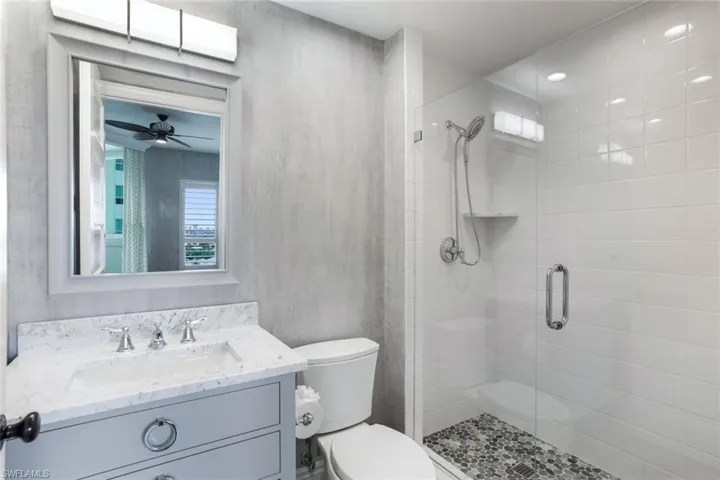 "Gray" guest bathroom.