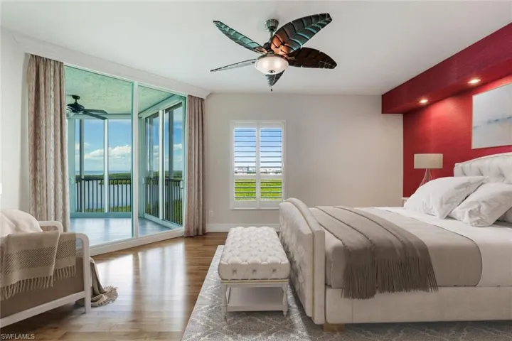 Large primary bedroom with sunset views.