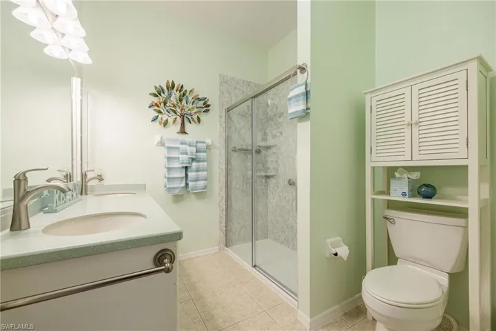 Guest Bathroom featuring dual sinks