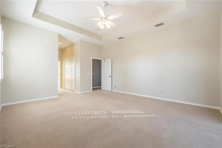 Master Bedroom with tray ceiling.