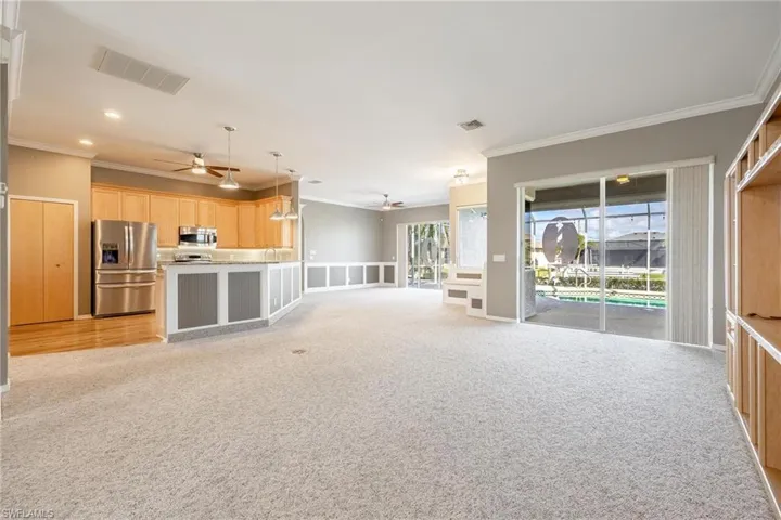 Living room/ FamilyRoom with  crown molding