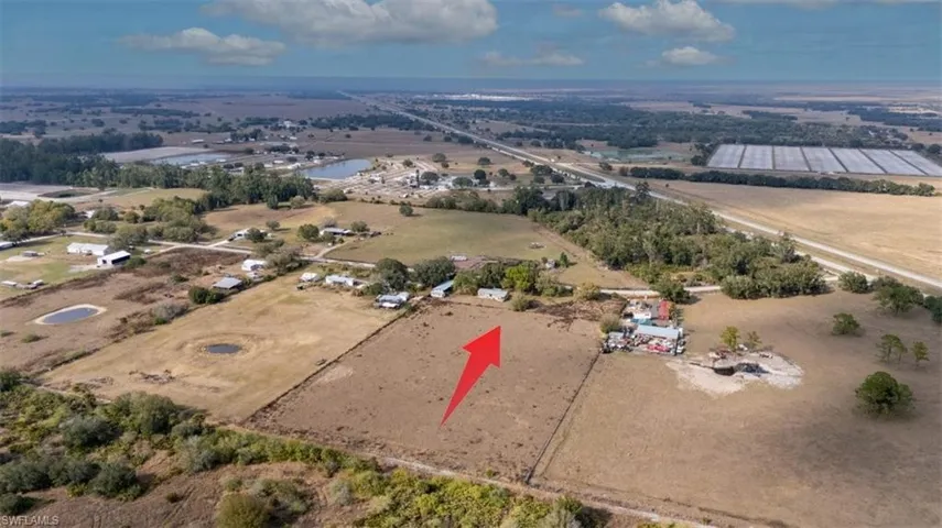 Aerial view of property's location featuring rural landscape