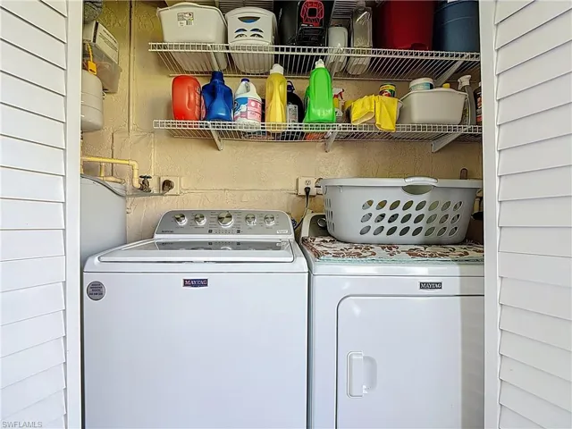 Laundry room featuring washer and dryer