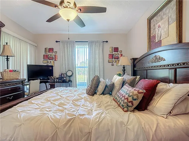 Bedroom featuring a ceiling fan