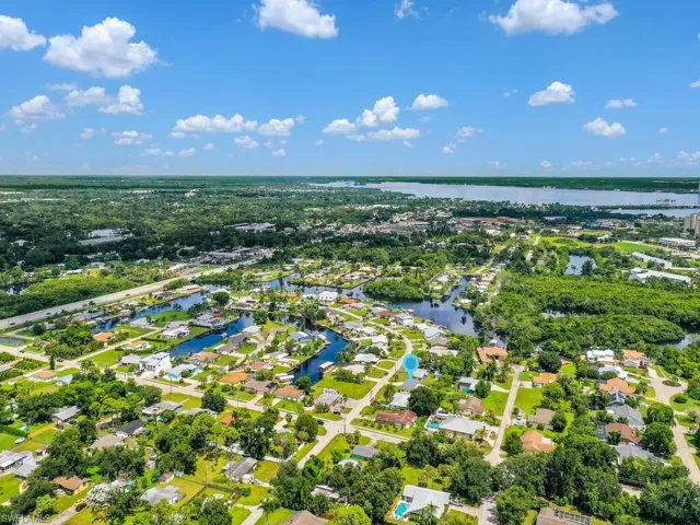 Aerial view with a residential view and a water view