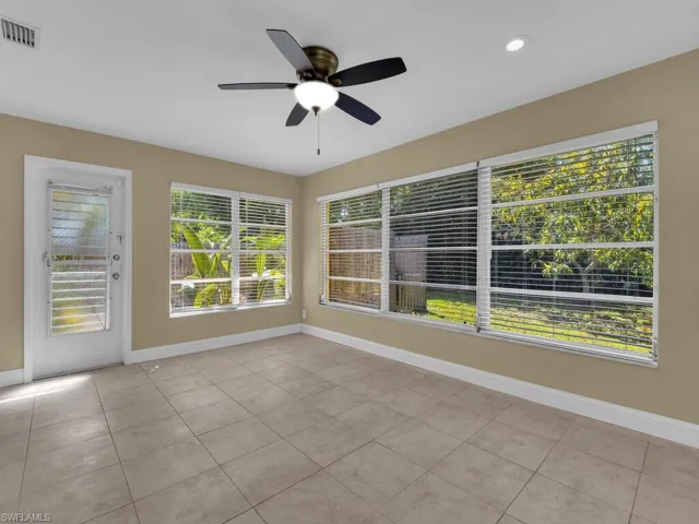 Unfurnished sunroom with visible vents