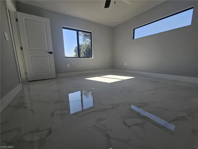 Unfurnished room with ceiling fan