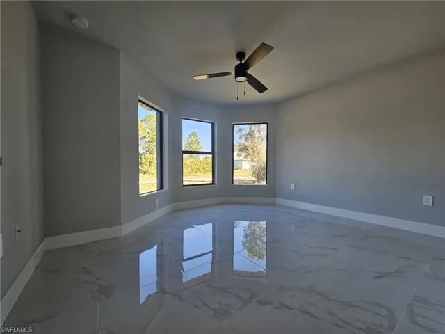 Spare room featuring ceiling fan