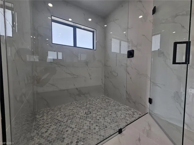 Bathroom featuring an enclosed shower