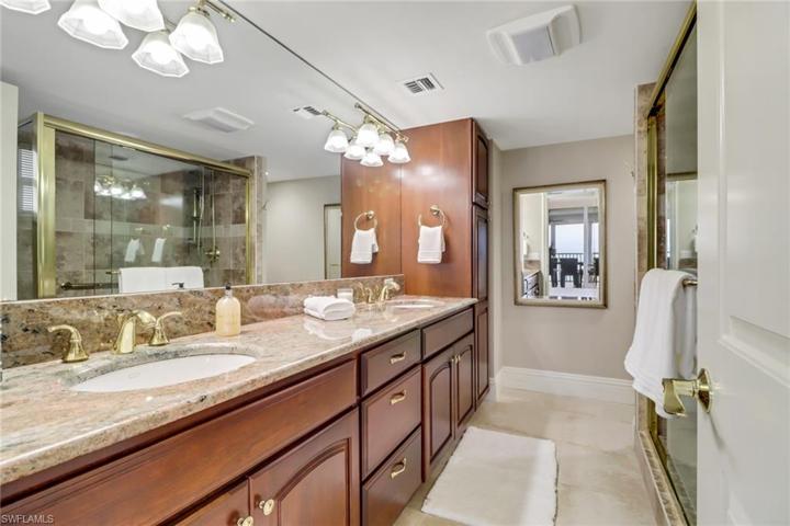 Master Bath with double sinks, granite counters, solid wood cabinets
