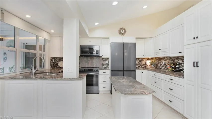 Tons of storage and there is a pantry too!