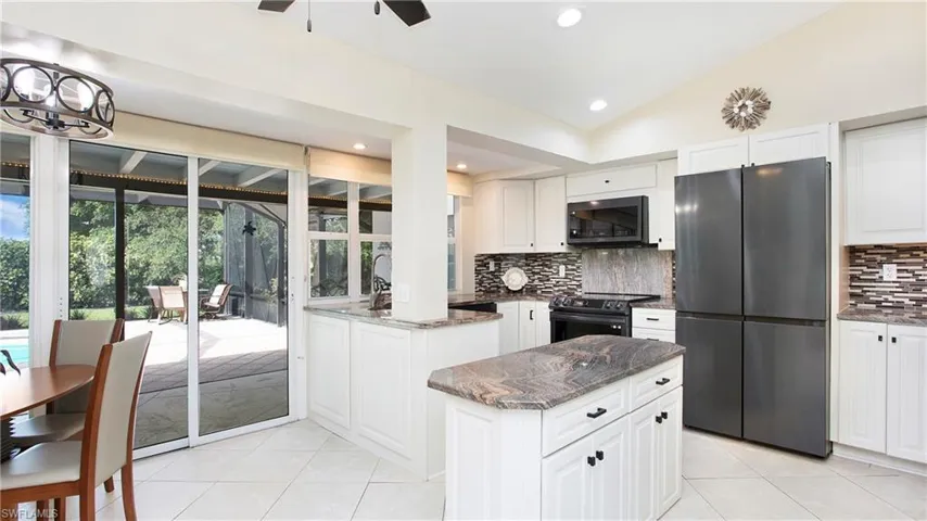 All new kitchen appliances with updated cabinetry colors and counters.