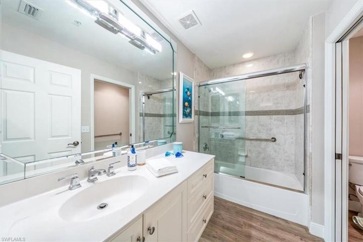 Guest bathroom with updated shower over tub
