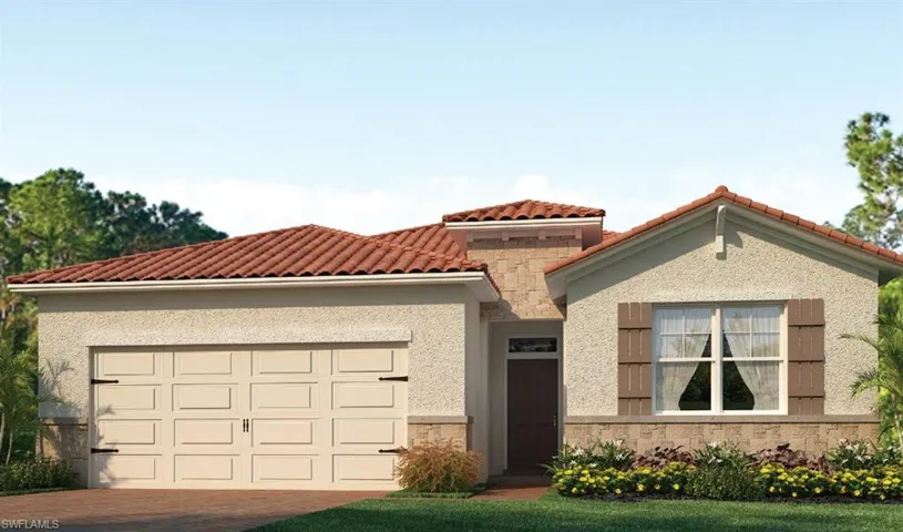 Mediterranean / spanish house with a garage