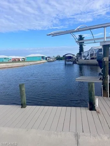 Dock with a water view and boat lift