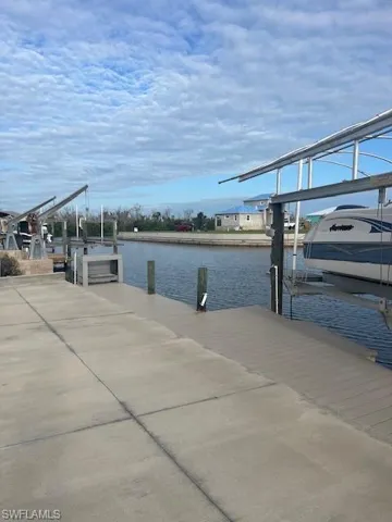 Dock with a water view and boat lift