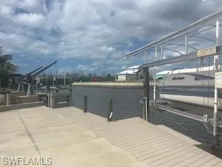 Dock featuring boat lift