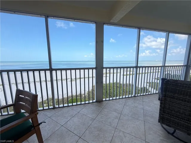 Screened Lanai with a beautiful beach view.