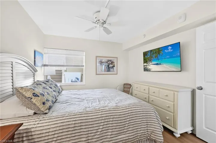 Guest Bedroom with Queen Bed and TV