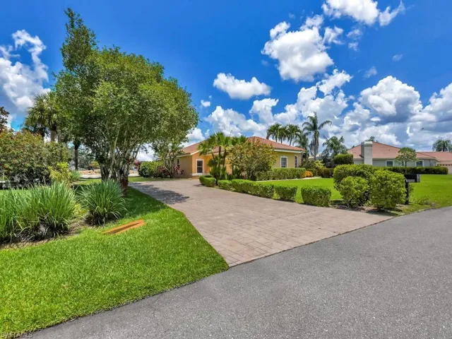 Tropical Landscaping & Long Driveway