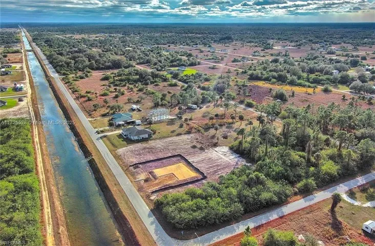 Aerial view of property and surrounding area