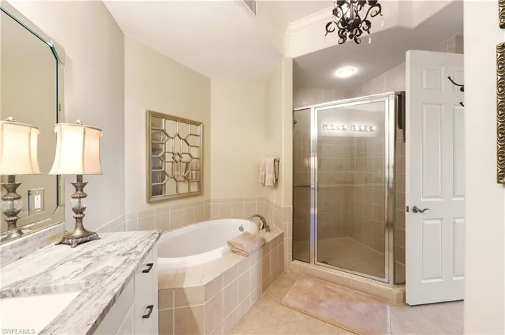 Primary bath with separate tub/shower combination