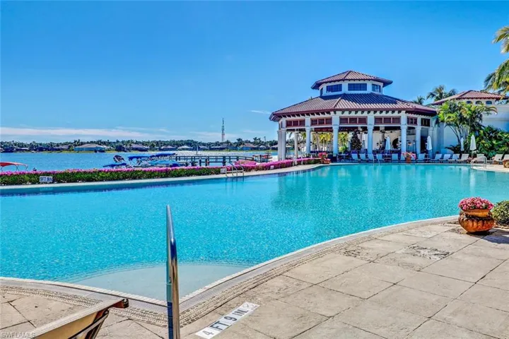 Miromar Lakes pool with Blue Water Beach Grill in background